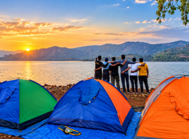 Vasota camping tents at sunset by Shivsagar Lake - Seven Hill Cottage Bamnoli