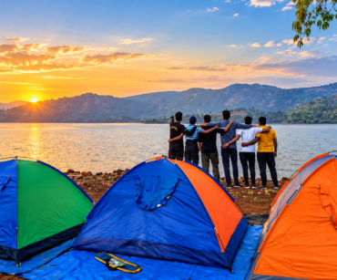 Vasota camping tents at sunset by Shivsagar Lake - Seven Hill Cottage Bamnoli